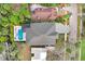 Top-down view of a house with pool and driveway at 2623 S Parkview St, Tampa, FL 33629