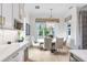 Kitchen breakfast nook with round table and chairs, and window views at 2623 S Parkview St, Tampa, FL 33629