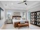 Elegant main bedroom, featuring a leather bed and stylish decor at 2623 S Parkview St, Tampa, FL 33629