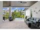 Outdoor patio with seating area and a view of the pool at 2623 S Parkview St, Tampa, FL 33629