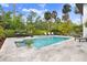 Inviting pool area with plenty of lounge chairs and a spa at 2623 S Parkview St, Tampa, FL 33629