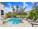 Inviting pool area with spa and lounge chairs at 2623 S Parkview St, Tampa, FL 33629