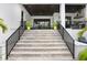 Elegant stone staircase leading to covered patio at 2623 S Parkview St, Tampa, FL 33629