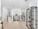 Light and bright upstairs hallway with modern metal railing and hardwood floors at 2623 S Parkview St, Tampa, FL 33629