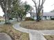 Residential street with houses and large trees at 3202 Cullendale Dr, Tampa, FL 33618