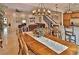 Elegant dining room with a large wooden table and chandelier at 3222 W Empedrado St, Tampa, FL 33629