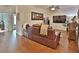 Relaxing living room with brown leather sectional sofa at 3222 W Empedrado St, Tampa, FL 33629