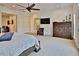 Comfortable main bedroom with ample space and a large TV at 3222 W Empedrado St, Tampa, FL 33629