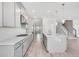 Spacious kitchen with a center island, subway tile backsplash, and pendant lighting at 33945 Landsman Loop, Wesley Chapel, FL 33543