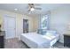 Comfortable bedroom with ensuite bathroom and large bed at 3405 W Swann Ave # 1, Tampa, FL 33609