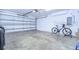 Spacious garage with extra storage shelving and room for a bike at 3405 W Swann Ave # 1, Tampa, FL 33609