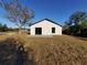 House backyard with grassy lawn at 3418 Eagle Pass St, North Port, FL 34286