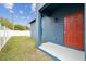 Newly built home with a small grassy backyard and privacy fence at 3469 17Th S Ave, St Petersburg, FL 33711