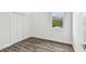 Well-lit bedroom featuring hardwood floors and a window at 3469 17Th S Ave, St Petersburg, FL 33711