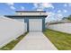 View of a two-car garage with a long driveway at 3469 17Th S Ave, St Petersburg, FL 33711