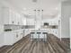 Modern kitchen featuring white cabinets and island at 3469 17Th S Ave, St Petersburg, FL 33711