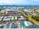 Aerial view highlighting a condo building near the water and a larger city at 3475 41St S Ter # 215, St Petersburg, FL 33711