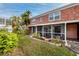 Brick building with screened porch and landscaping at 3475 41St S Ter # 215, St Petersburg, FL 33711