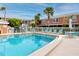 Community pool with plenty of lounge chairs at 3475 41St S Ter # 215, St Petersburg, FL 33711