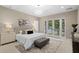 Main bedroom with water views and sitting area at 3507 Bayshore Blvd # 102, Tampa, FL 33629