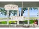 Elegant dining room with crystal chandelier and water views at 3507 Bayshore Blvd # 102, Tampa, FL 33629