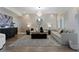 Living room with neutral colored sofas and hardwood floors at 3507 Bayshore Blvd # 102, Tampa, FL 33629