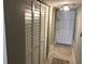 Bright hallway with tiled floor and storage at 3717 46Th S Ave # 2, St Petersburg, FL 33711