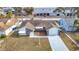 Aerial view of a single Gathering home with a large backyard at 4024 Jib Sail Ct, New Port Richey, FL 34652