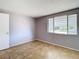 Bedroom with tile floors and a window at 4024 Jib Sail Ct, New Port Richey, FL 34652