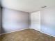 Empty bedroom with tile floors and closet at 4024 Jib Sail Ct, New Port Richey, FL 34652