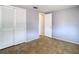 Simple bedroom with ceramic tile floors, closet and neutral color scheme at 4024 Jib Sail Ct, New Port Richey, FL 34652