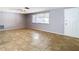 Living room featuring tile floors and neutral walls at 4024 Jib Sail Ct, New Port Richey, FL 34652