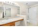 Bathroom with vanity, sink, and a shower/tub combo at 4409 Winding River Way, Land O Lakes, FL 34639