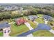 Overhead view features the property's layout with fenced yard and screened pool at 4534 Cozzo Dr, Land O Lakes, FL 34639