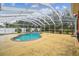 Screened-in pool offers a relaxing retreat with ample space for outdoor enjoyment at 4534 Cozzo Dr, Land O Lakes, FL 34639