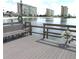 A dock with a bench overlooking the water at 4575 Cove Cir # 904, Madeira Beach, FL 33708