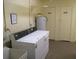 Shared laundry room with coin-operated machines at 4575 Cove Cir # 904, Madeira Beach, FL 33708