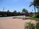 Covered parking area with brick paved access road at 4575 Cove Cir # 904, Madeira Beach, FL 33708