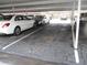 Covered parking garage with designated parking spots for residents at 4575 Cove Cir # 904, Madeira Beach, FL 33708