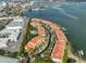 Aerial view of waterfront community near the beach at 4625 Mirabella Ct, St Pete Beach, FL 33706