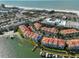 Aerial view showing location of condo within waterfront community at 4625 Mirabella Ct, St Pete Beach, FL 33706