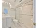 Bathroom boasts a large shower and modern vanity at 4625 Mirabella Ct, St Pete Beach, FL 33706