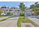 Townhouses with private driveways and landscaping at 4625 Mirabella Ct, St Pete Beach, FL 33706