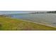 Stunning waterfront view with grassy area at 4625 Mirabella Ct, St Pete Beach, FL 33706