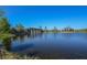 Scenic lake view with stone arch bridge at 5208 Savino Cir, Palmetto, FL 34221