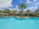 Expansive resort-style pool with comfortable seating at 5208 Savino Cir, Palmetto, FL 34221