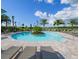 Circular pool with surrounding lounge chairs at 5208 Savino Cir, Palmetto, FL 34221