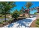 Walkway by pond with stonework and arbor at 5208 Savino Cir, Palmetto, FL 34221