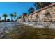 Multiple water features cascade into a pond at 5208 Savino Cir, Palmetto, FL 34221