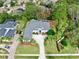 Stunning aerial view of a single Gathering home and neighborhood at 5253 Mira Vista Dr, Palm Harbor, FL 34685